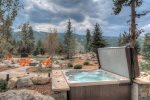 Stargaze while relaxing in your private hot tub with unbeatable views.